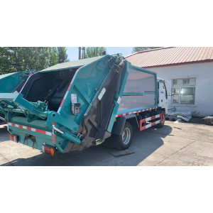 Garbage truck ISUZU ELF 100P, 4x2, 130 hp, 6 m3